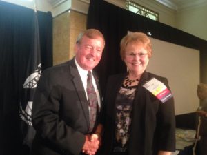 Lt Gen Dana Atkins, MOAA President and CEO, congratulating Evelyn Brady on receipt of Five Star Level of Excellence Award. Photo courtesy of Maj Gen Buck Marr